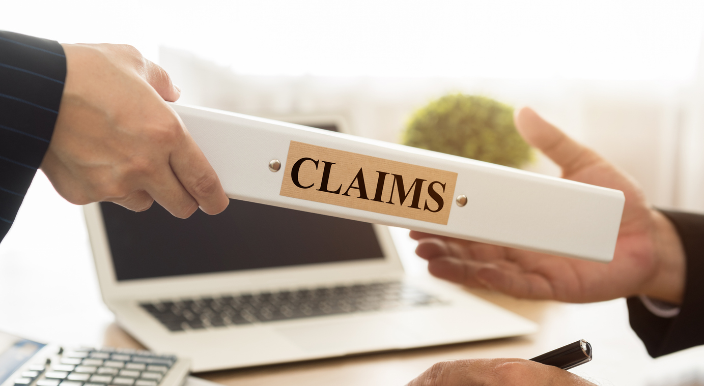 Lawyers filed a claims document of the customer to the insurance company. insurance claim concept